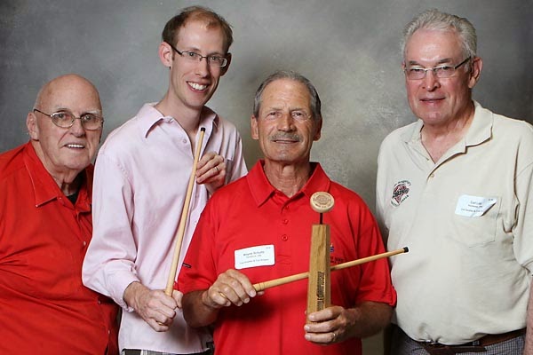 Wayne Schultz posing with the top 4 cues players at the 2014 World Crokinole Championship. Photo Credit: Bill Gladding