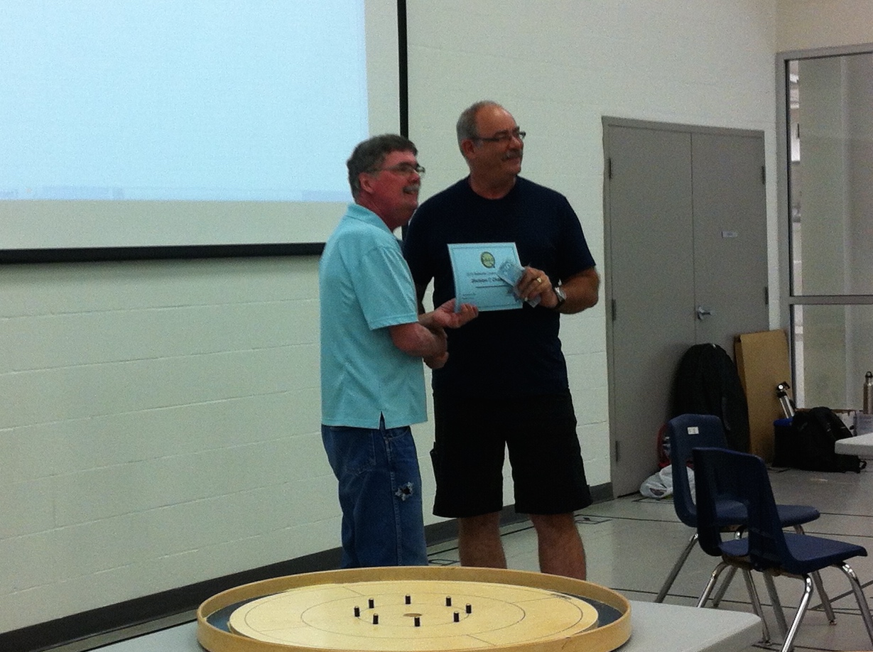 Peter Klaassen, right, accepting the top prize in Group C from Dave Brown, left.