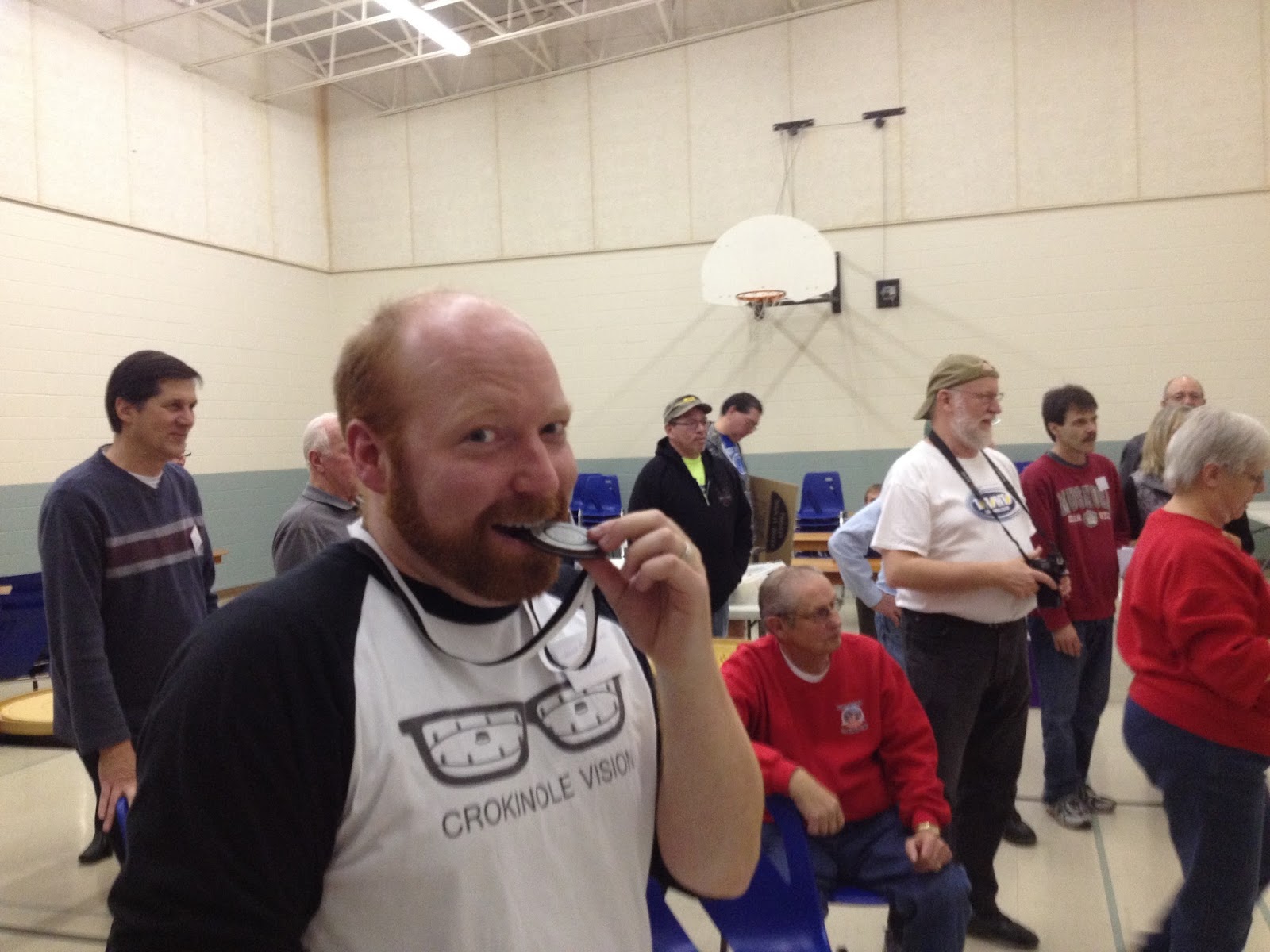 Jason Beierling enjoying a tasty bite out of his silver medal.